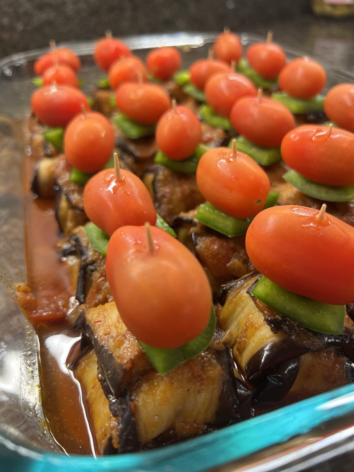 İslim Kebabı — eggplant-wrapped meatballs with tomato and pepper